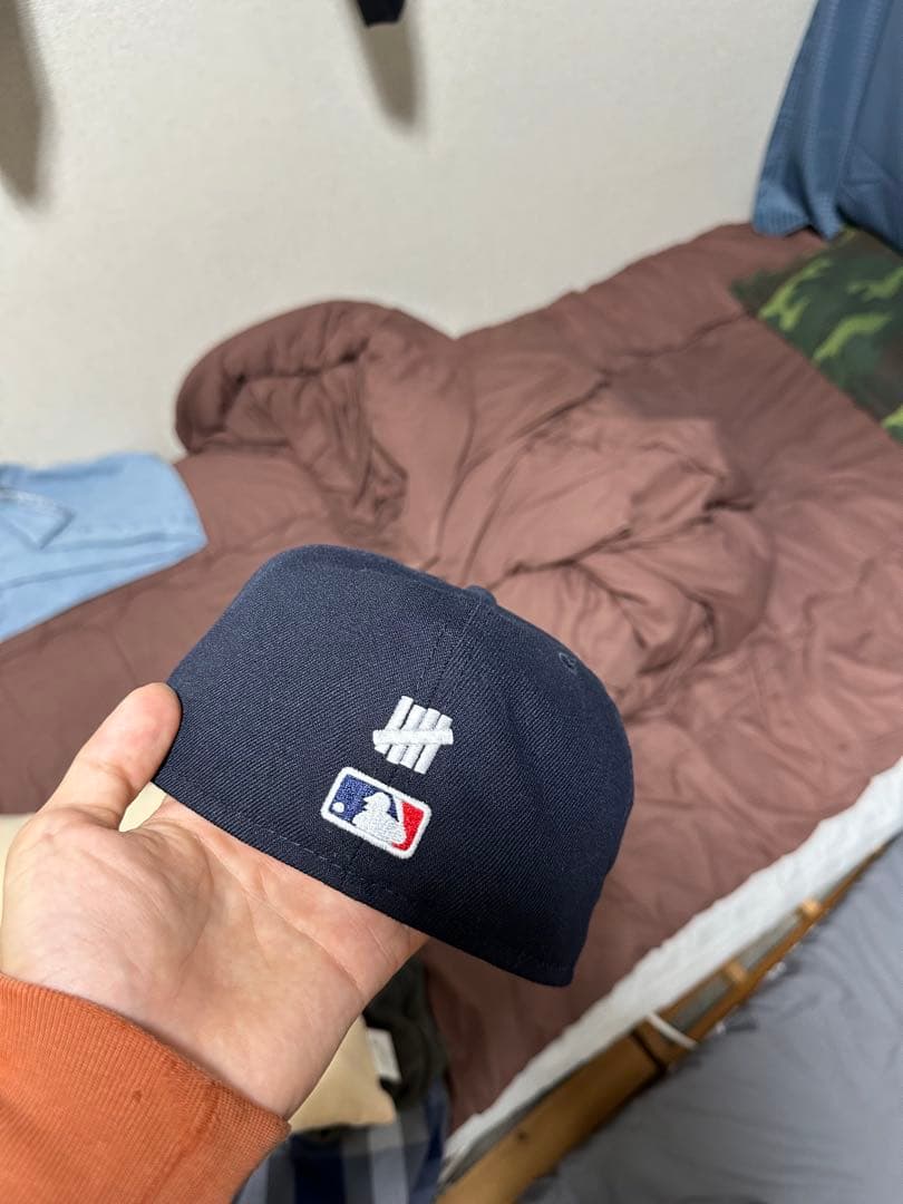 応援グッズ New era x Undefeated Cap 7 3/8
