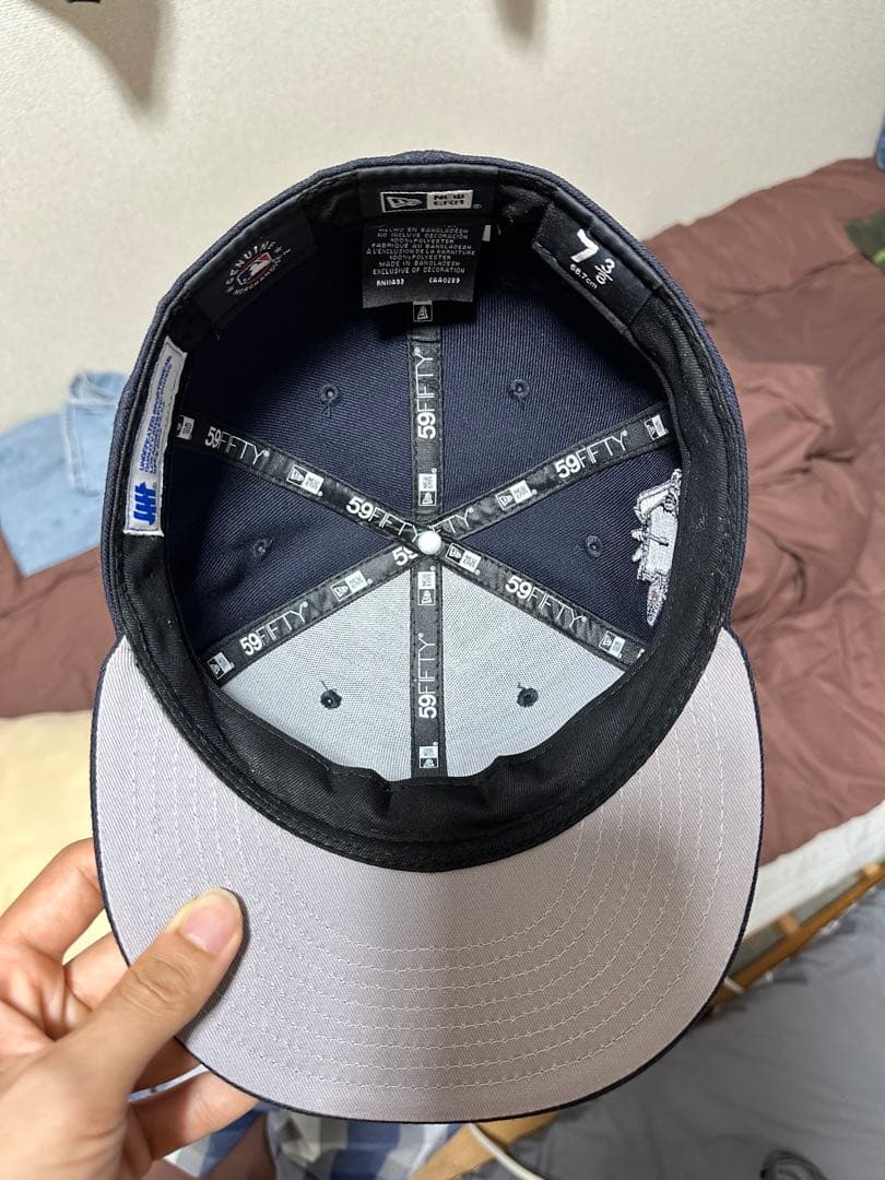 応援グッズ New era x Undefeated Cap 7 3/8