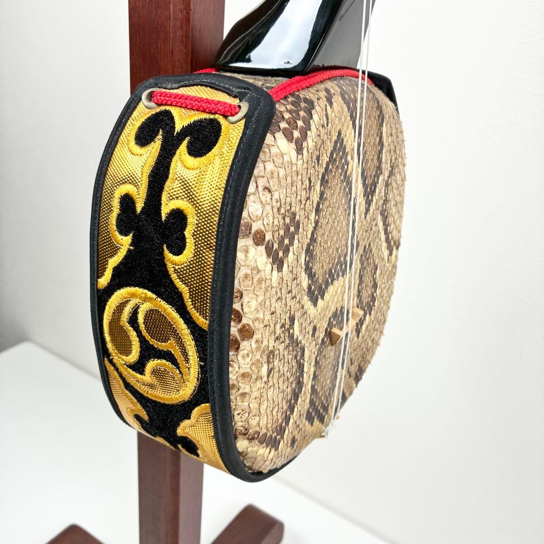 沖縄 三線 本蛇皮 黒漆 カラクイ1本欠品