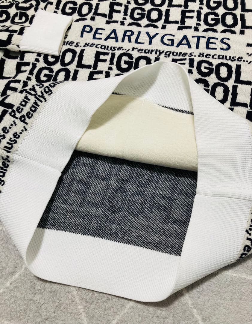 新品 パーリーゲイツ GOLF柄ジャガード ニット フーディ(4)サイズM/白