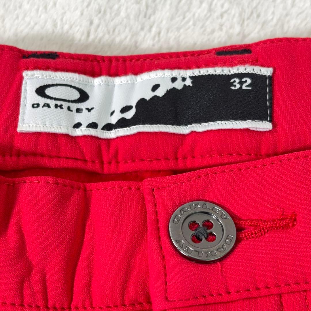 タグ付美品【OAKLEY】ゴルフパンツ 撥水 防寒 裏起毛 ロゴ刺繍 赤系 32