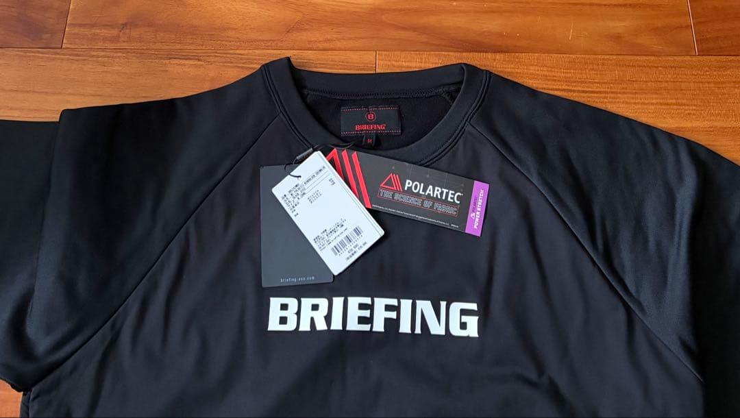 24AWブリーフィングゴルフPOLARTEC WINDBLOCKクルーネック黒M