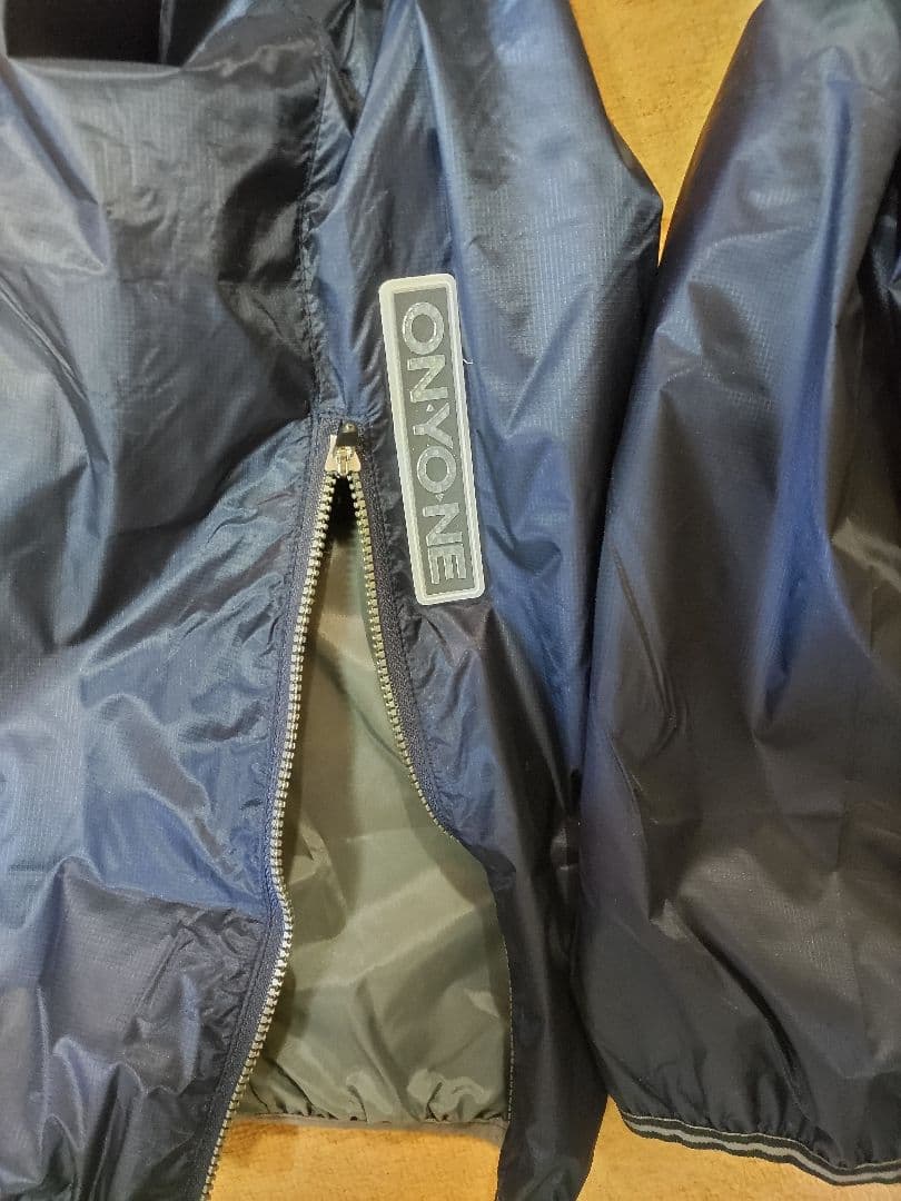 新品タグ付き保管品 ONYONE SAROMON TEAM ウインドブレーカー