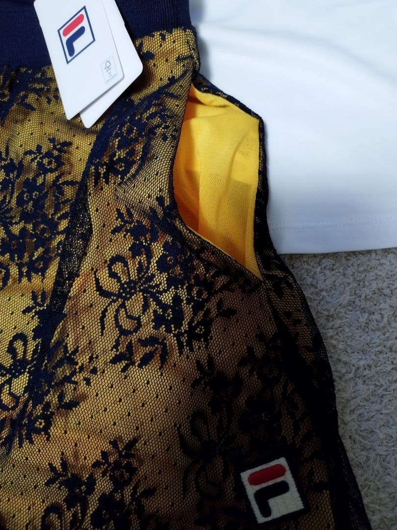 大人可愛い　L新品　FILAフィラ テニス・バドミントンウェア スコート レース