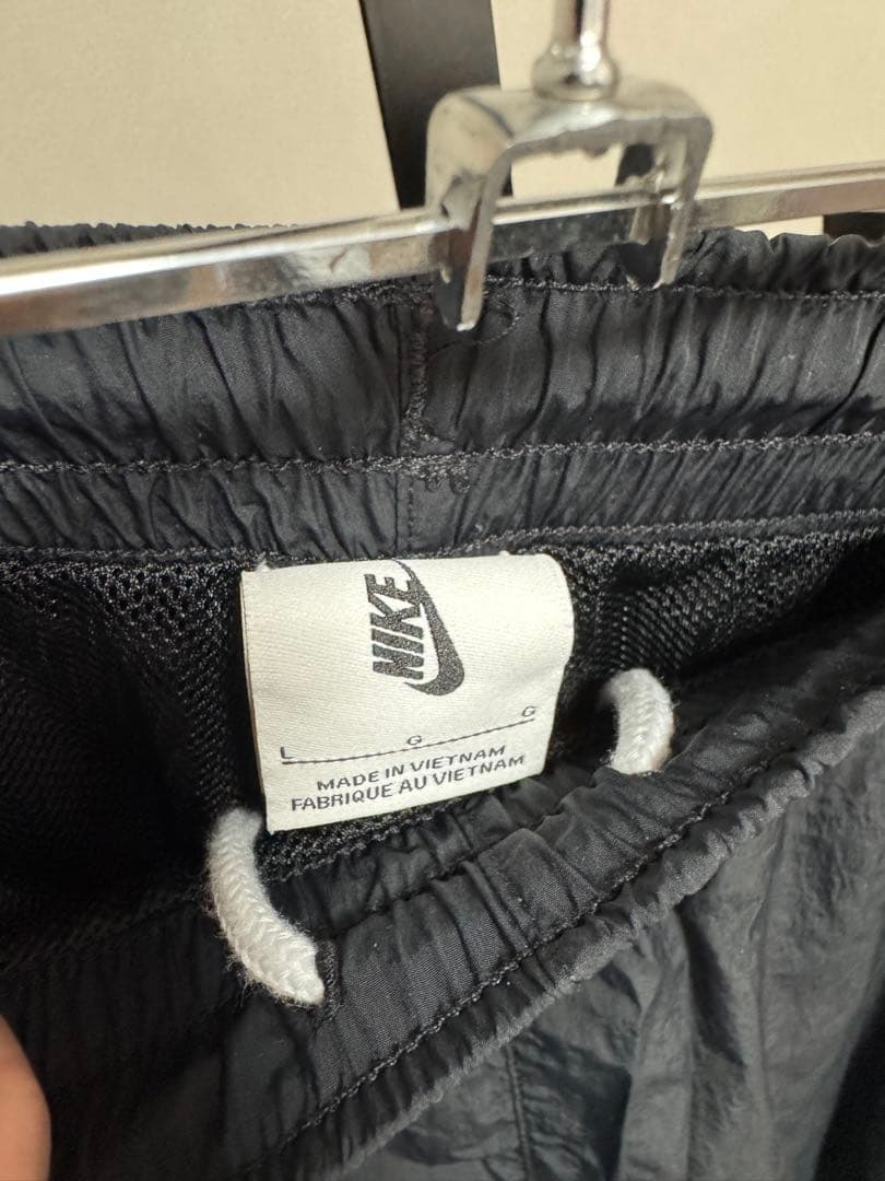 未使用級 NIKE ソロ スウッシュ トラックパンツ L ブラック ナイロン