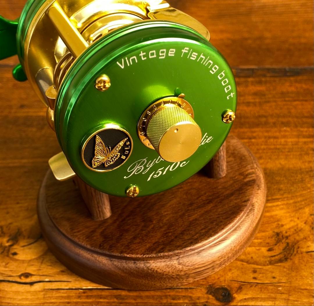 新品未使用　トラウト　ベイトリール　丸型　リール　グリーン×ゴールド　渓流釣り