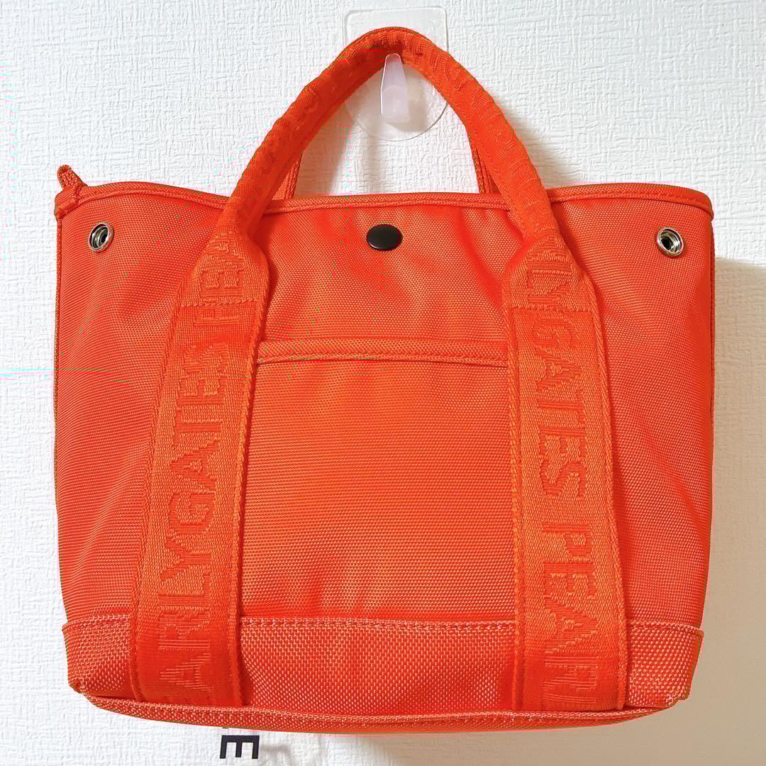 極美品 パーリーゲイツ ゴルフバッグ オレンジ ロゴチャーム付きカートバッグ