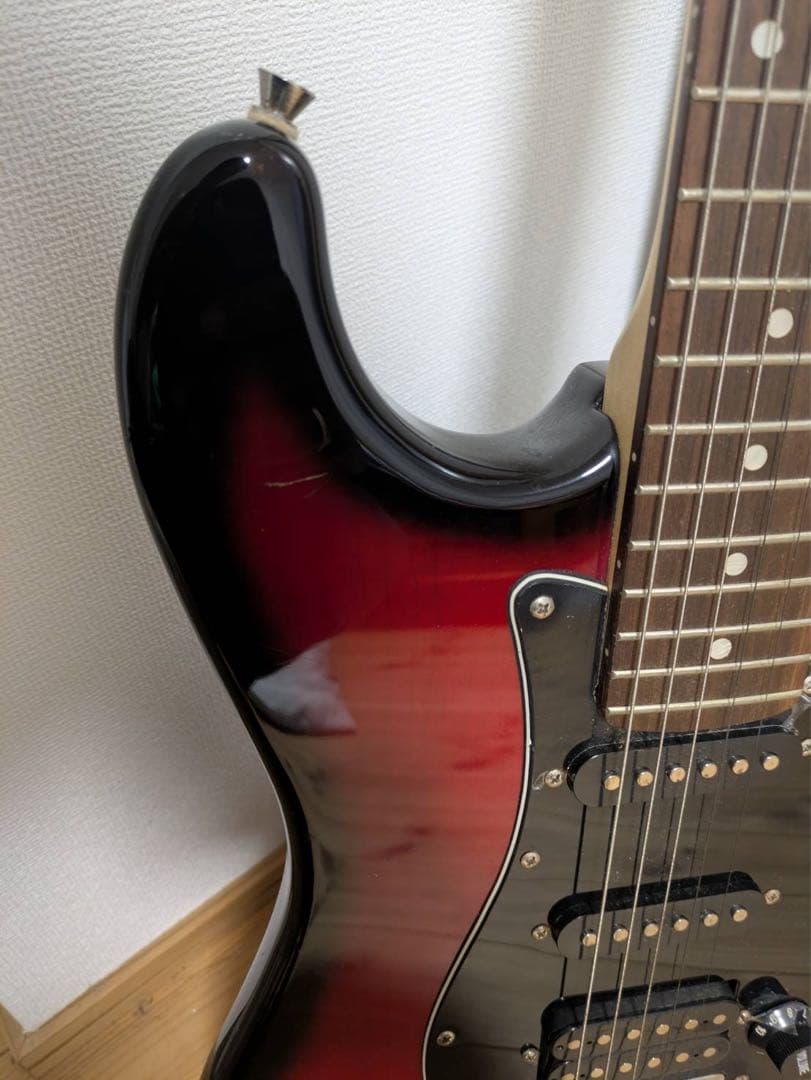 スチュワート ストラトキャスタータイプ エレキギター - レッド/ブラック中古