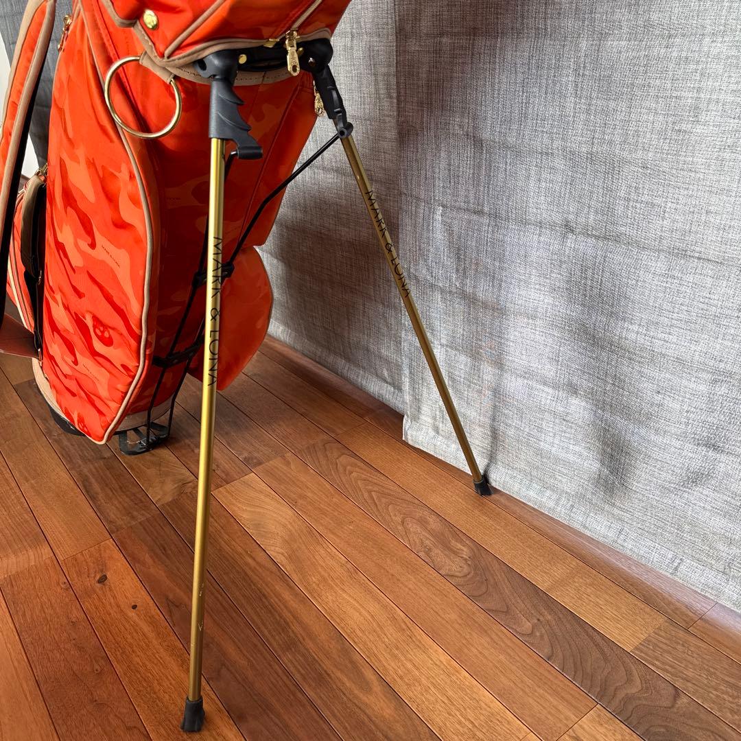 マークアンドロナ 迷彩 カモフラ ゴルフ キャディバッグ オレンジ