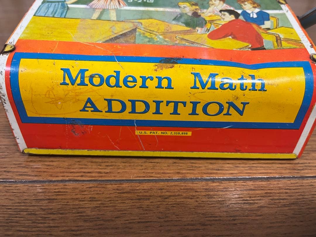 アメリカ Wolverine 社製のブリキ知育玩具