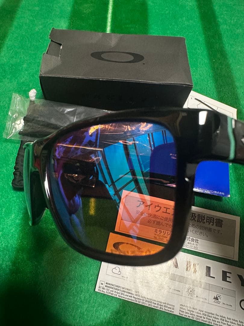 Oakley サングラス ブラックフレーム プリズム偏光レンズ ゴルフ