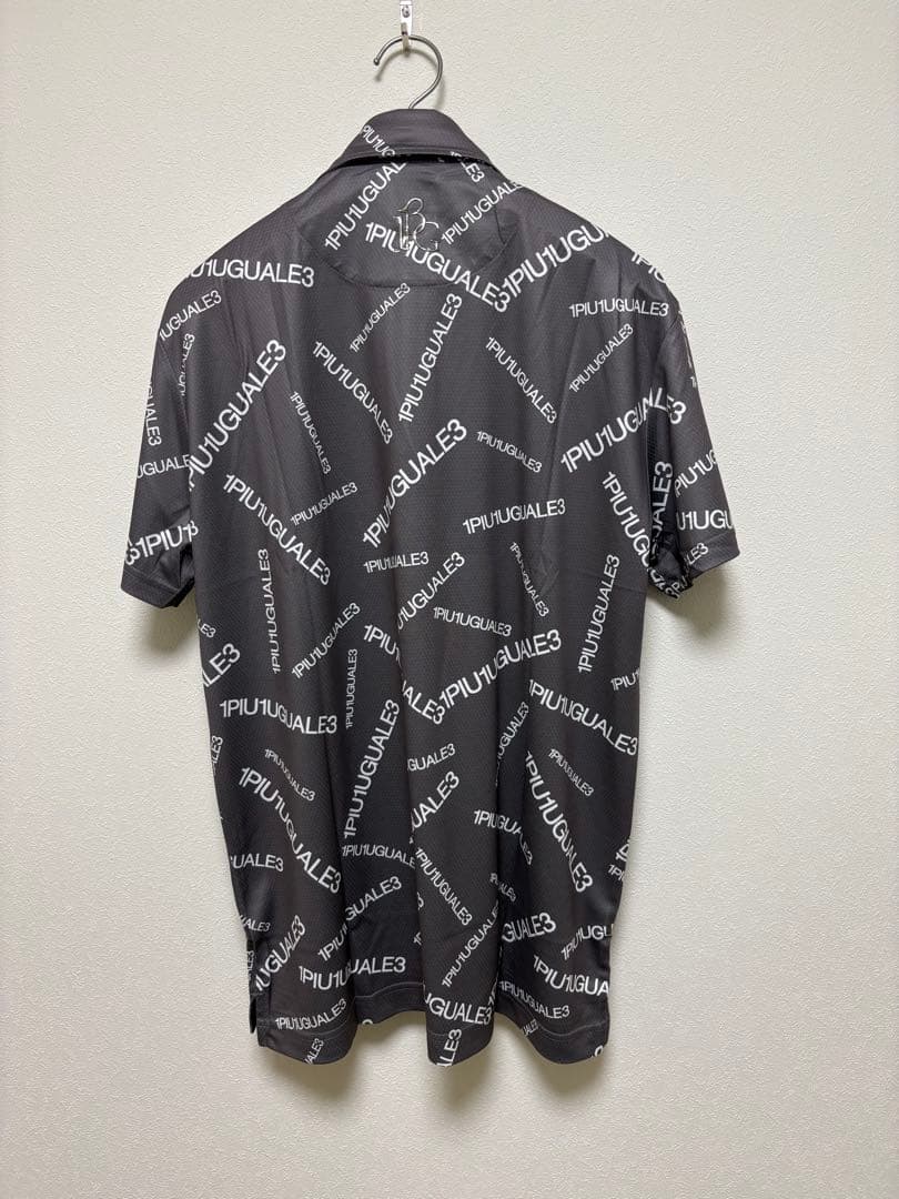 新品1PIU1UGUALE3 GOLF24SSランダムロゴ総柄ポロシャツ灰Ⅵ