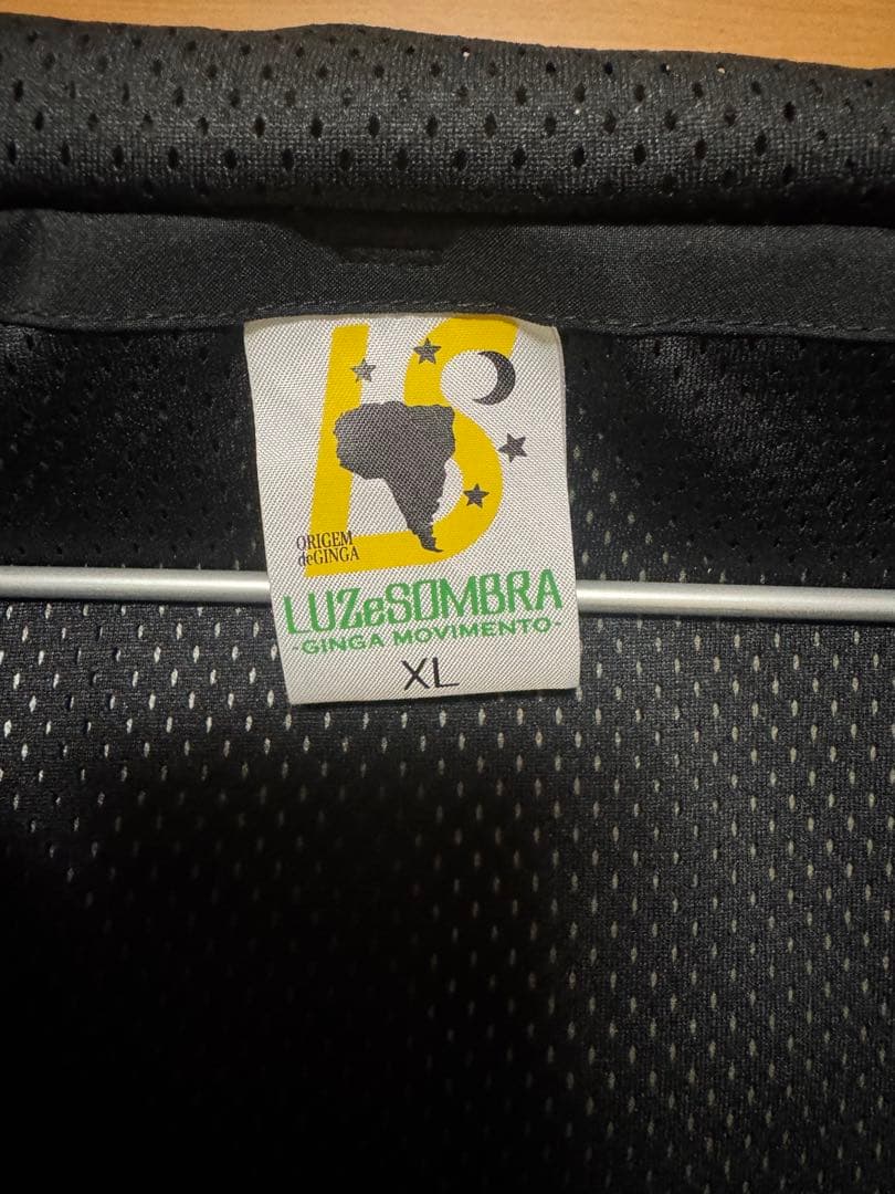 Luz e Sombra ルースインソブラ　未使用ピステウィンドブレーカー XL