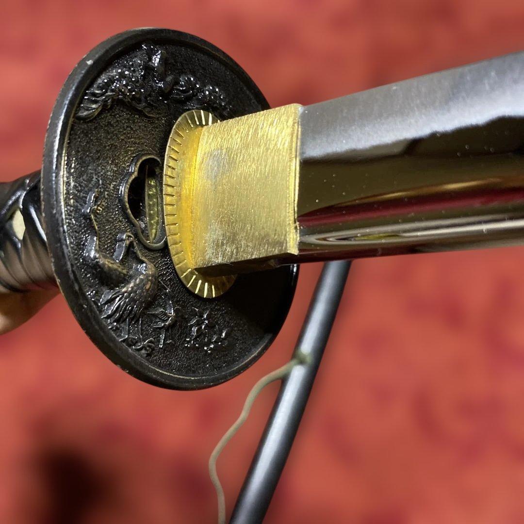 豪華居合刀 黒革巻柄 鶴松図楕円鍔 黒梨地鞘