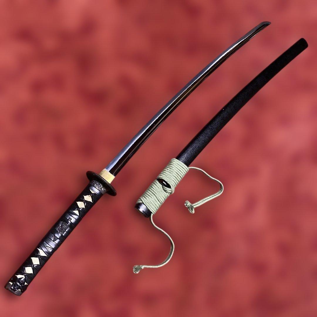 豪華居合刀 黒革巻柄 鶴松図楕円鍔 黒梨地鞘