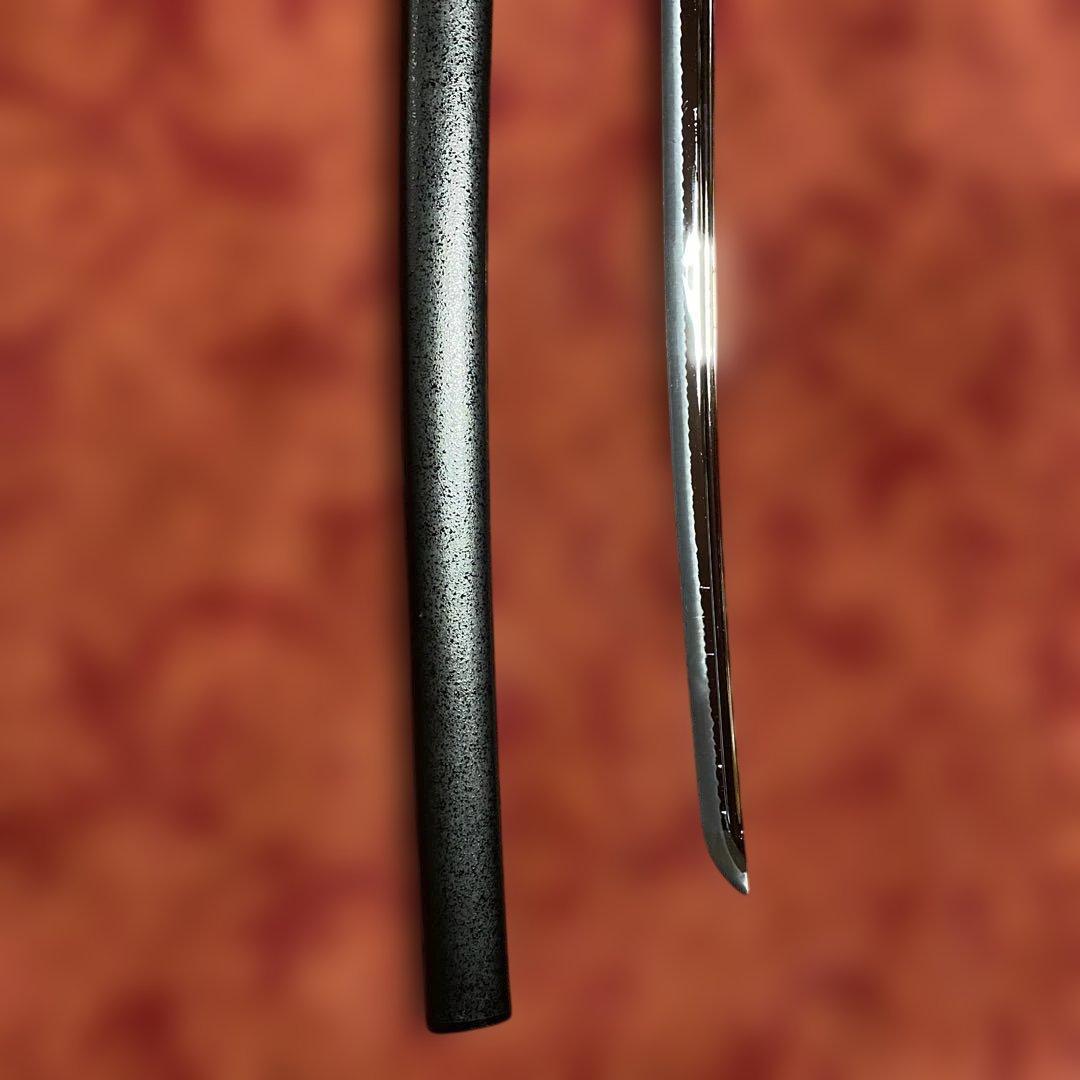 豪華居合刀 黒革巻柄 鶴松図楕円鍔 黒梨地鞘