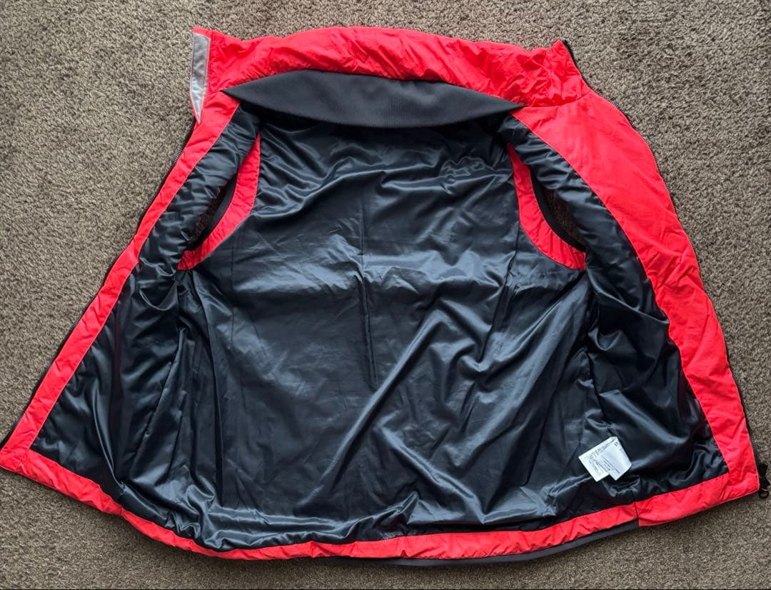 Oakley ピンク　ダウンベスト　中綿　斜めジップ　スカル　ゴルフ　テック系