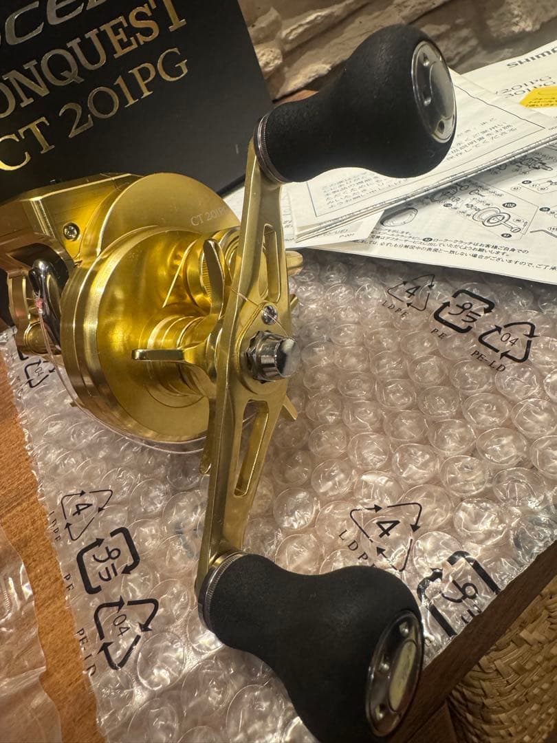 18 オシアコンクエストCT201PG シマノ左巻き＋ PE0.8号300m紅牙