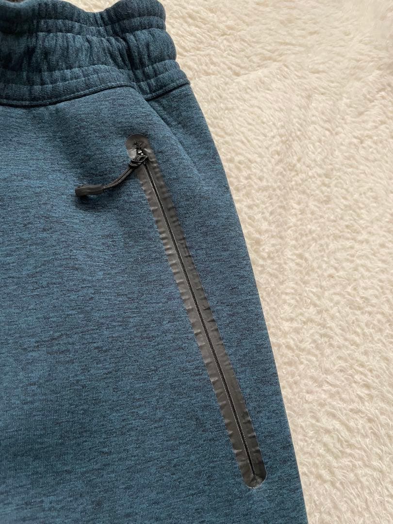 ダイワ　DAIWA ウィンドブロックジョガーパンツ　XLサイズ　フェザーブルー