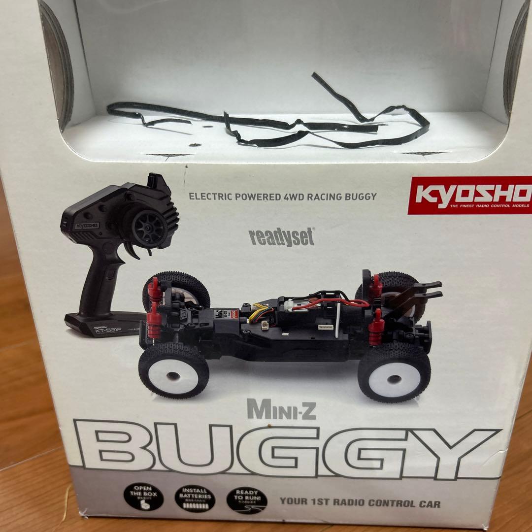 タカクワツトム