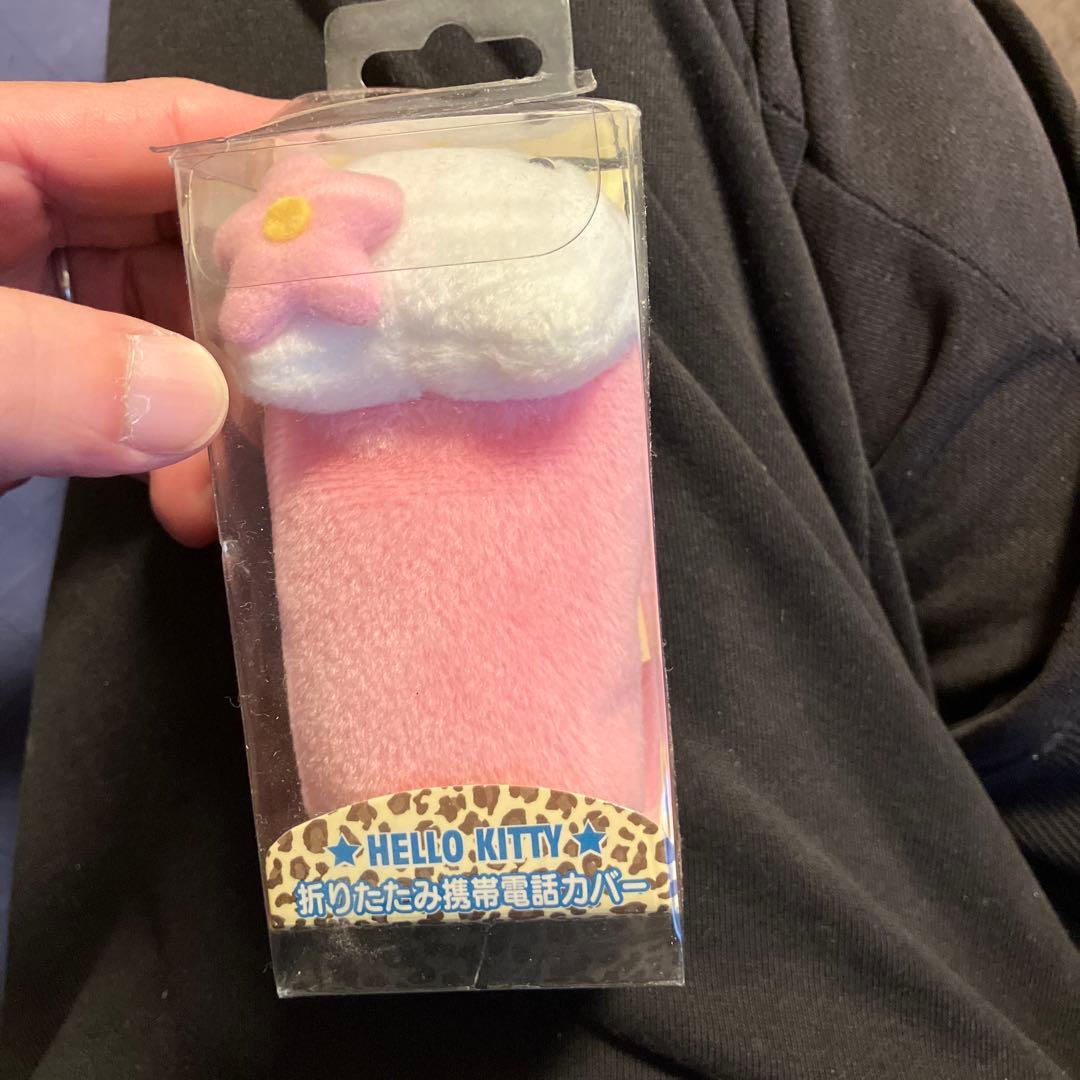 ハローキティ 携帯電話カバー 花飾り付き