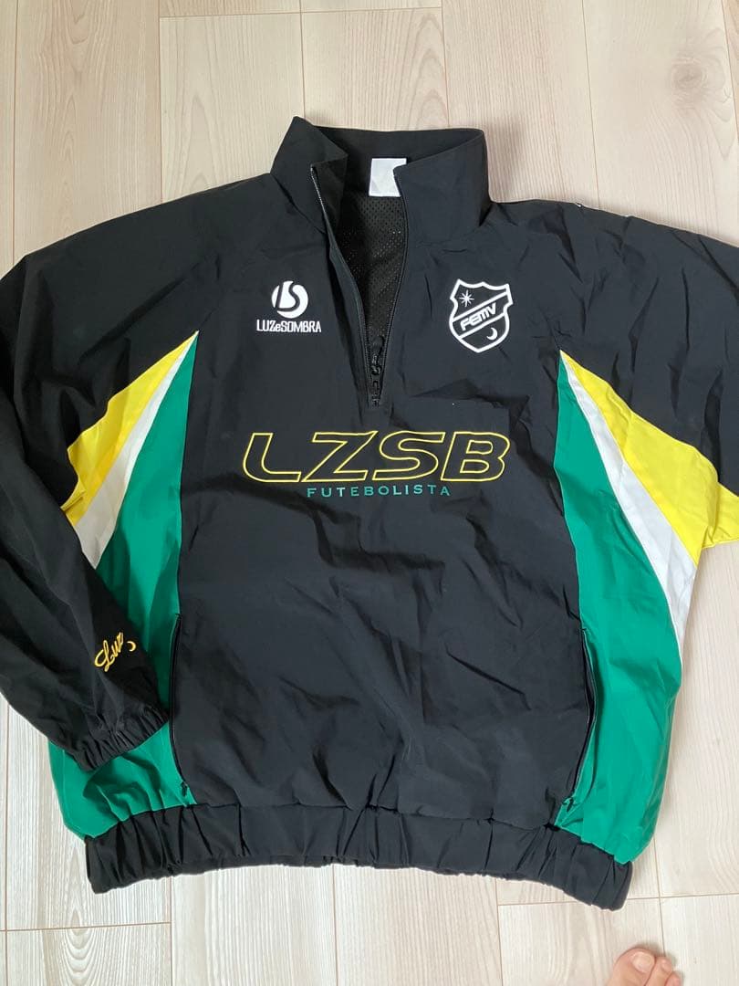 LUZ e SOMBRA ピステ・ウィンドブレーカー M