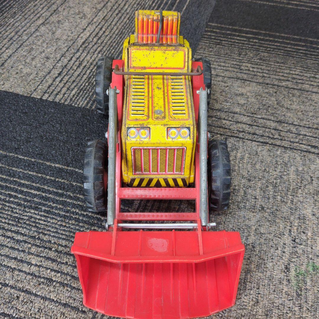 ブリキの 動くショベル付き建設車両