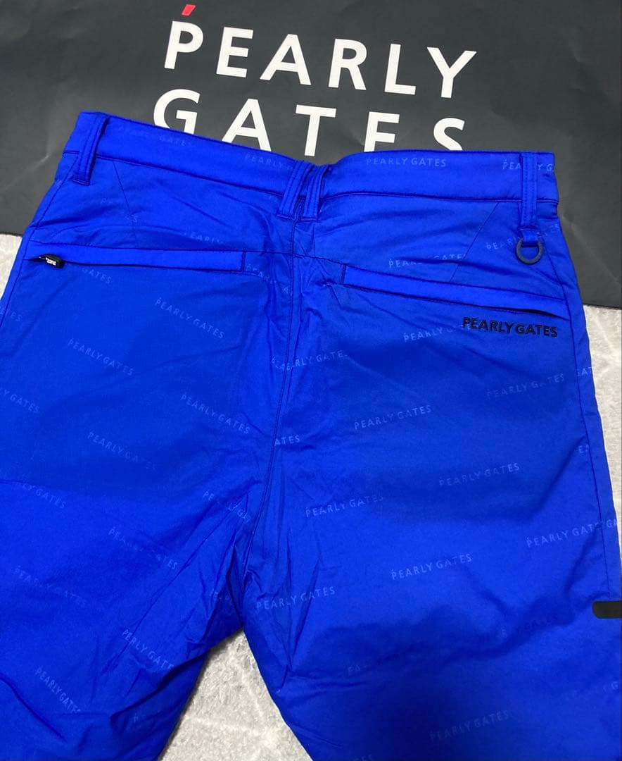新品 パーリーゲイツ ナイロンストレッチロゴジャガード パンツ(4)サイズM/青