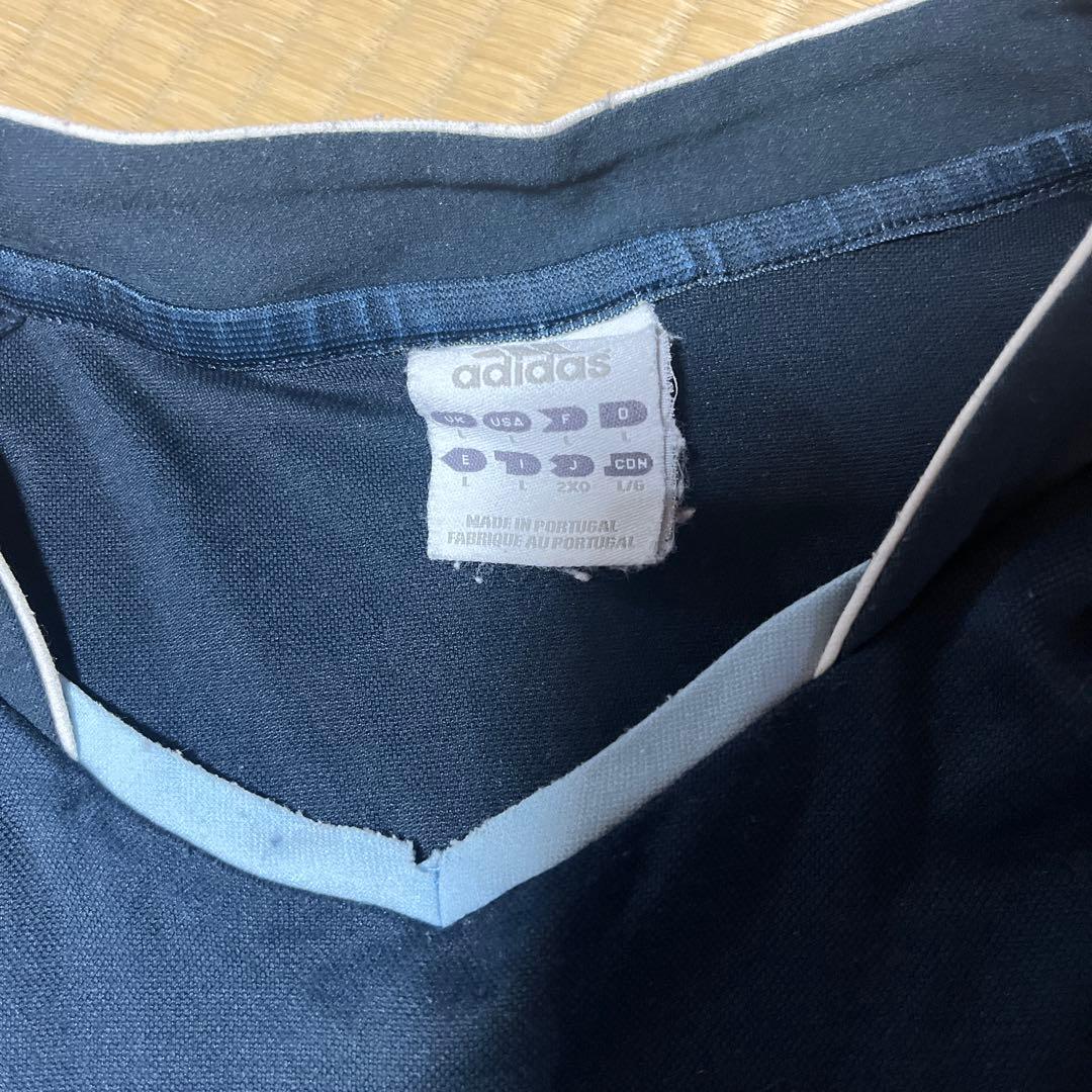 サッカーウェア二枚まとめ売りマンチェスターU Lサイズ　レアル・マドリード2XO