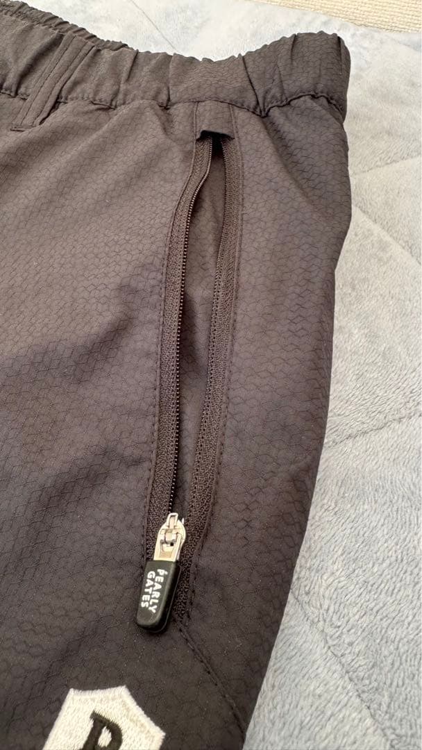 パーリーゲイツ ゴルフウェア パンツ 蓄熱保温 黒 ブラック メンズ