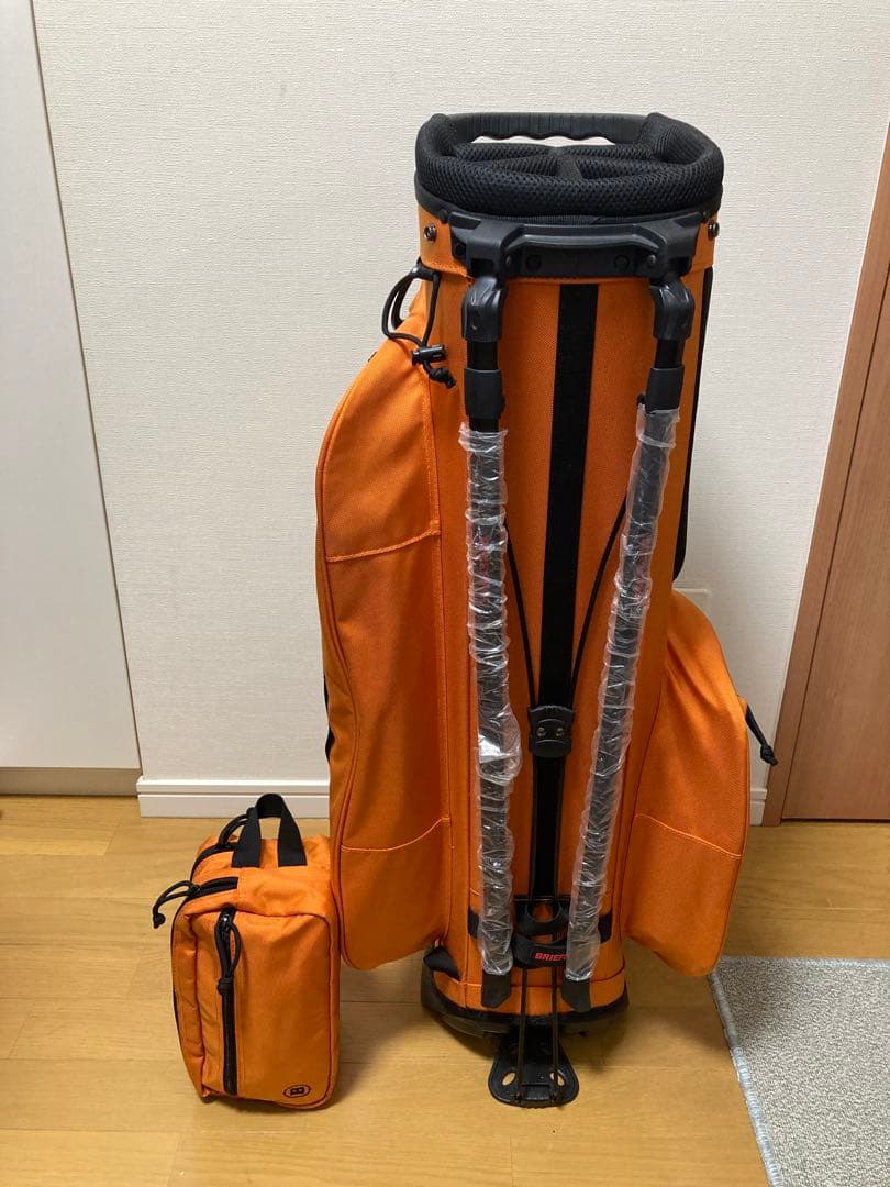 希少セット　BRIEFING キャディバッグ オレンジ　ラウンドポーチセット