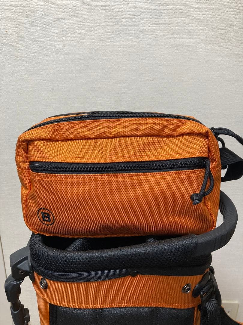 希少セット　BRIEFING キャディバッグ オレンジ　ラウンドポーチセット