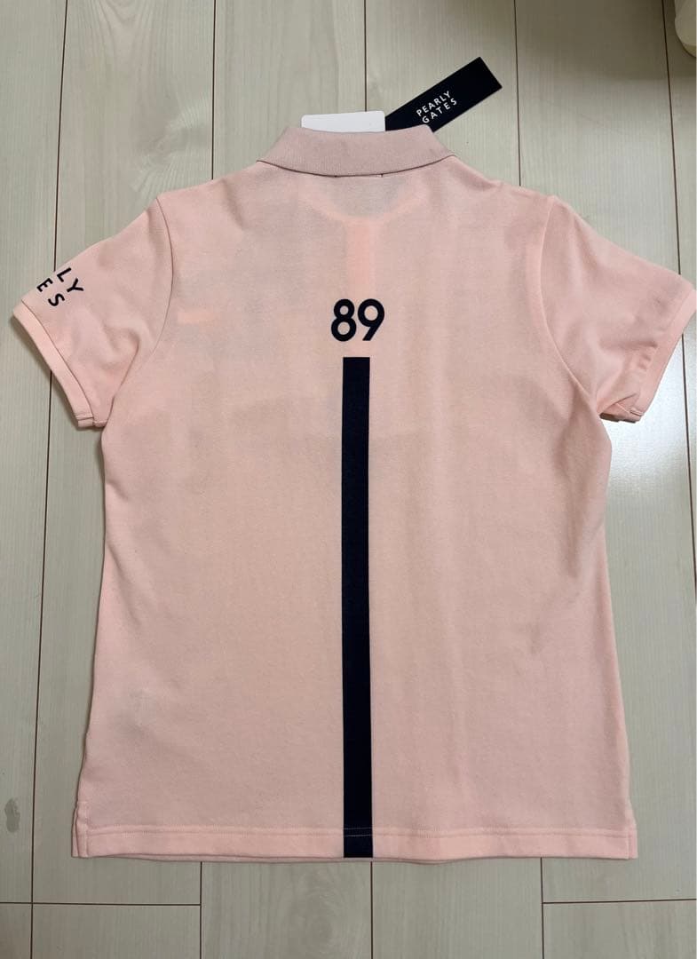 新品タグ付き　即完売さくら色ポロシャツ　スカートも出品してますよー