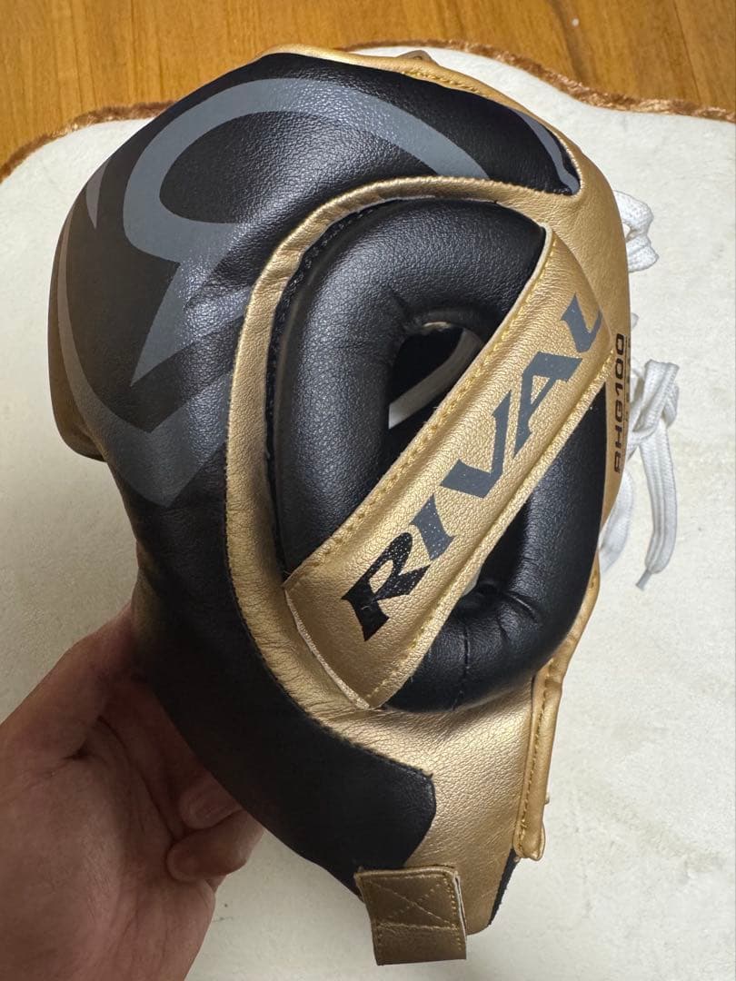 RIVAL 100シリーズ ヘッドギア M ゴールド/ブラック