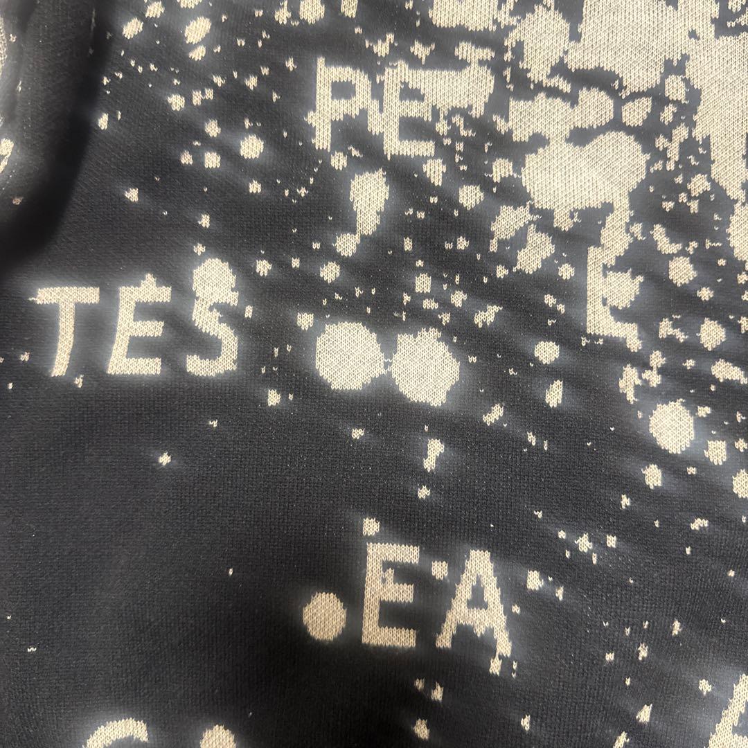 パーリーゲイツ　PG スプラッター模様 ハイネックセーター