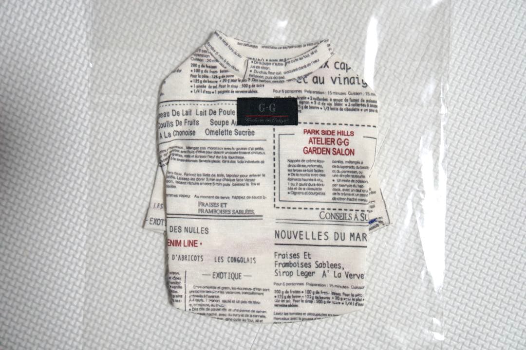 アトリエgg ニュースペーパー柄トップス