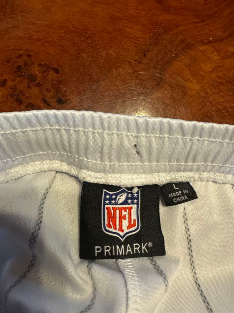 NFL RAIDERS白黒ストライプジャージショーツL