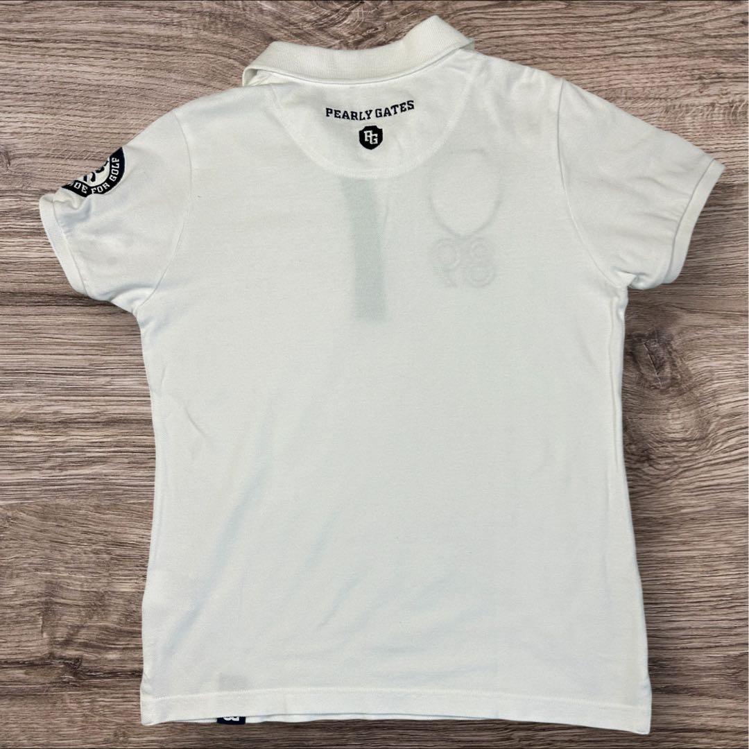 【セットアップ】パーリーゲイツ 鹿の子ポロシャツ & チェック柄ミニスカート 1