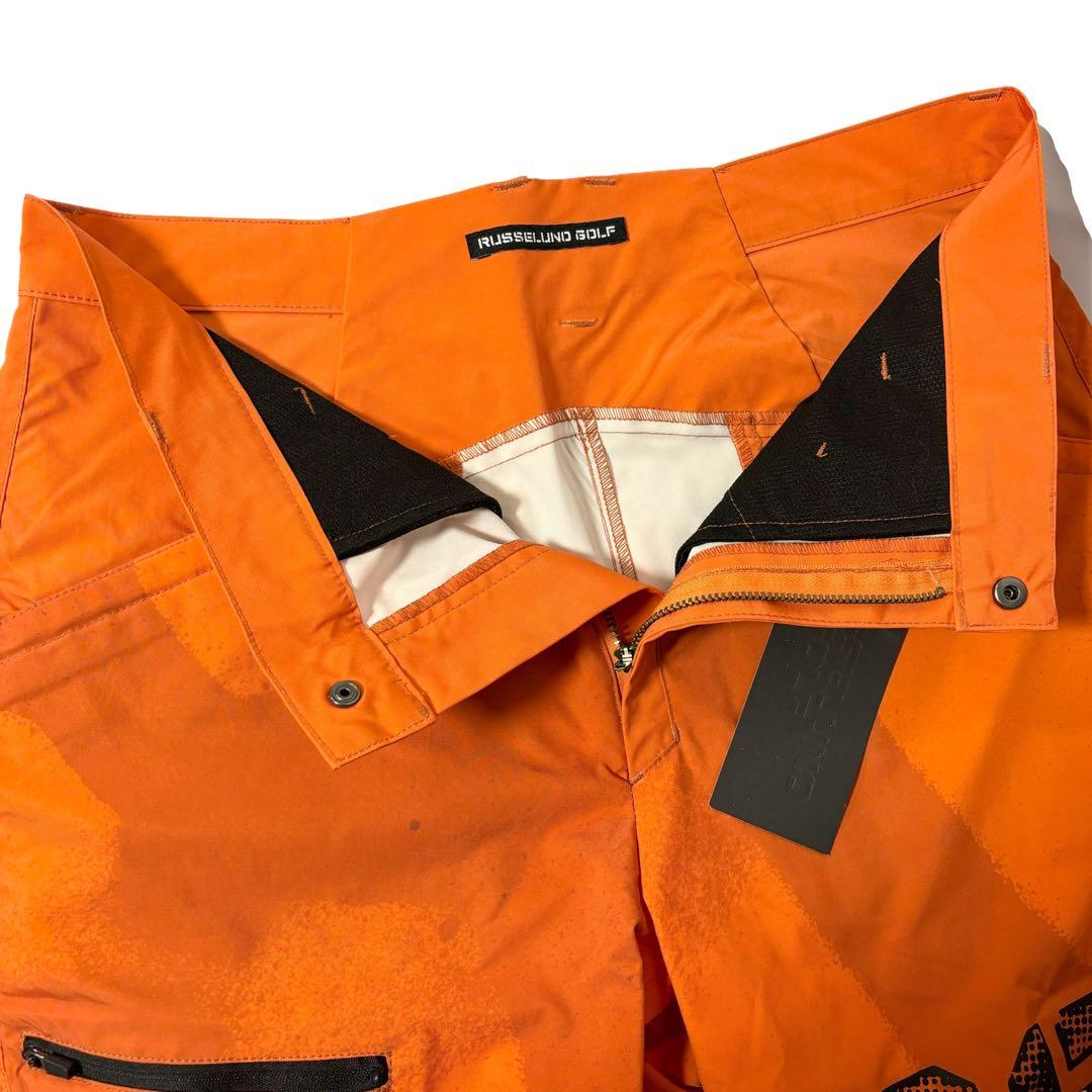 ラッセルノ ゴルフ RS ロゴ リフレクター ショーツ スプレー オレンジ L
