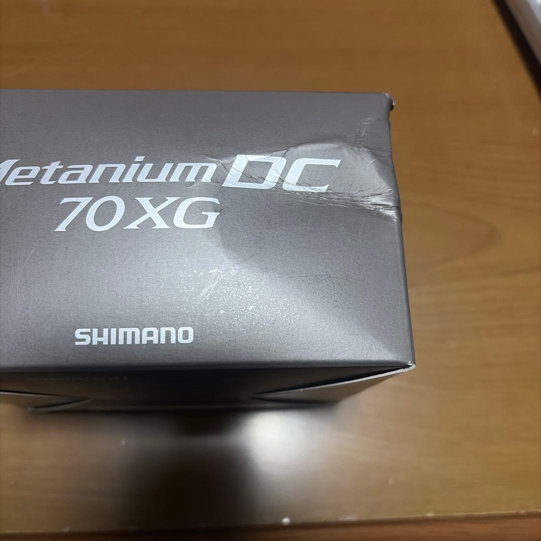 SHIMANO nium DC 70XG メタニウムDC (左)