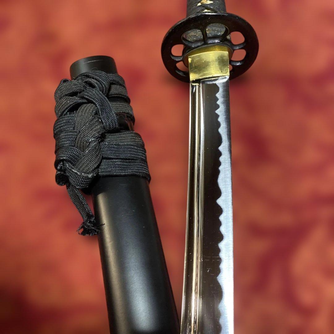 高級居合刀 黒柄 蓮根輪切透し丸鍔 黒呂鞘