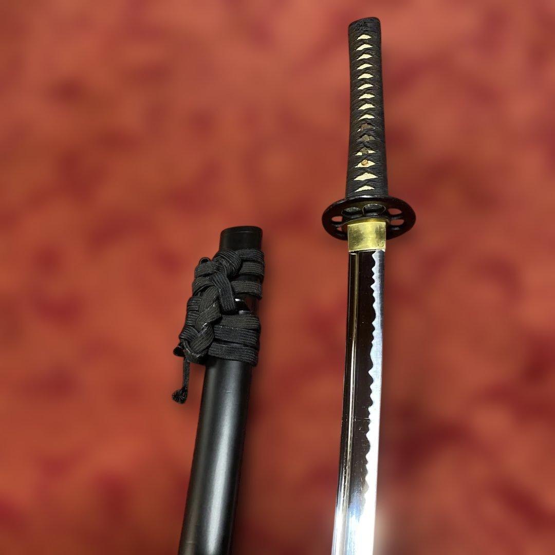 高級居合刀 黒柄 蓮根輪切透し丸鍔 黒呂鞘