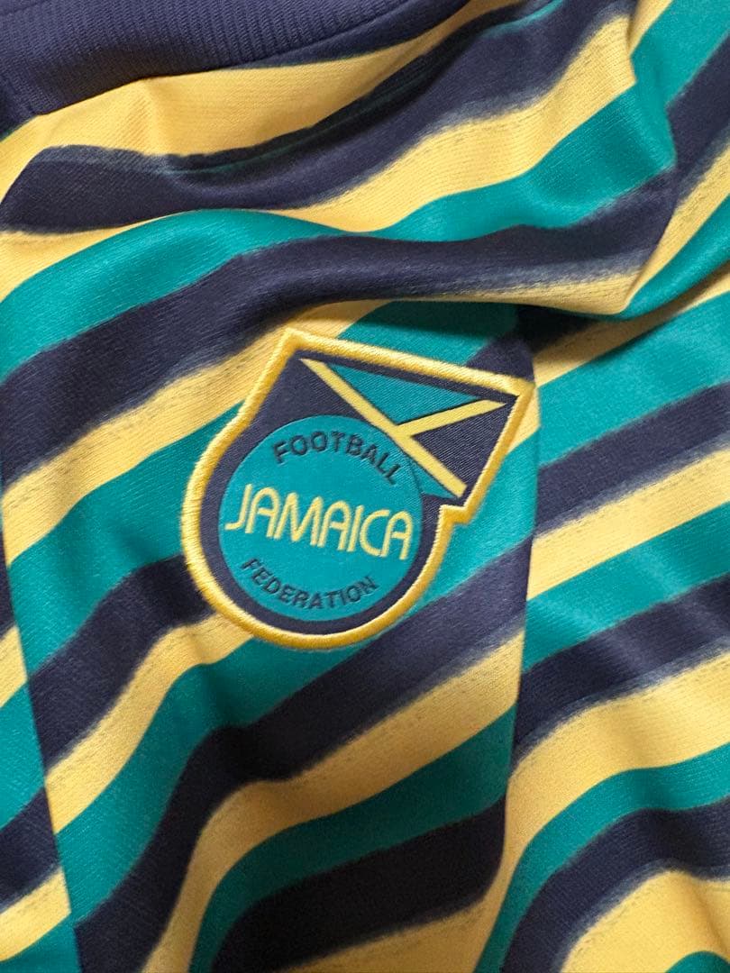 adidas ストライプシャツ ジャマイカ色