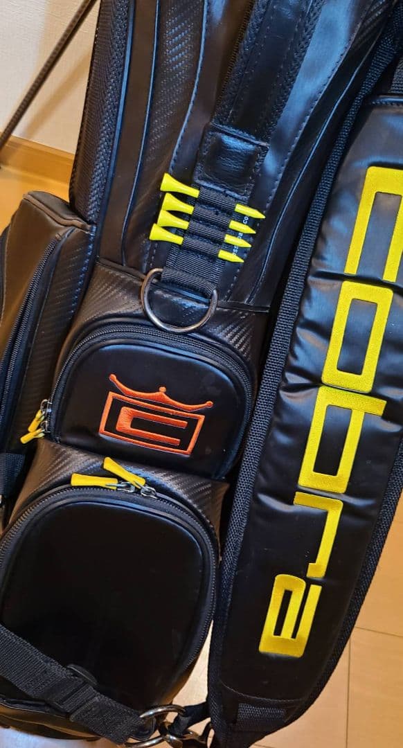 コブラ　ベゼルコラボスタンドバッグ 黒/黄色