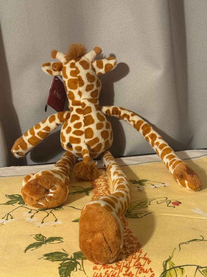 NY FAO キリンのお人形