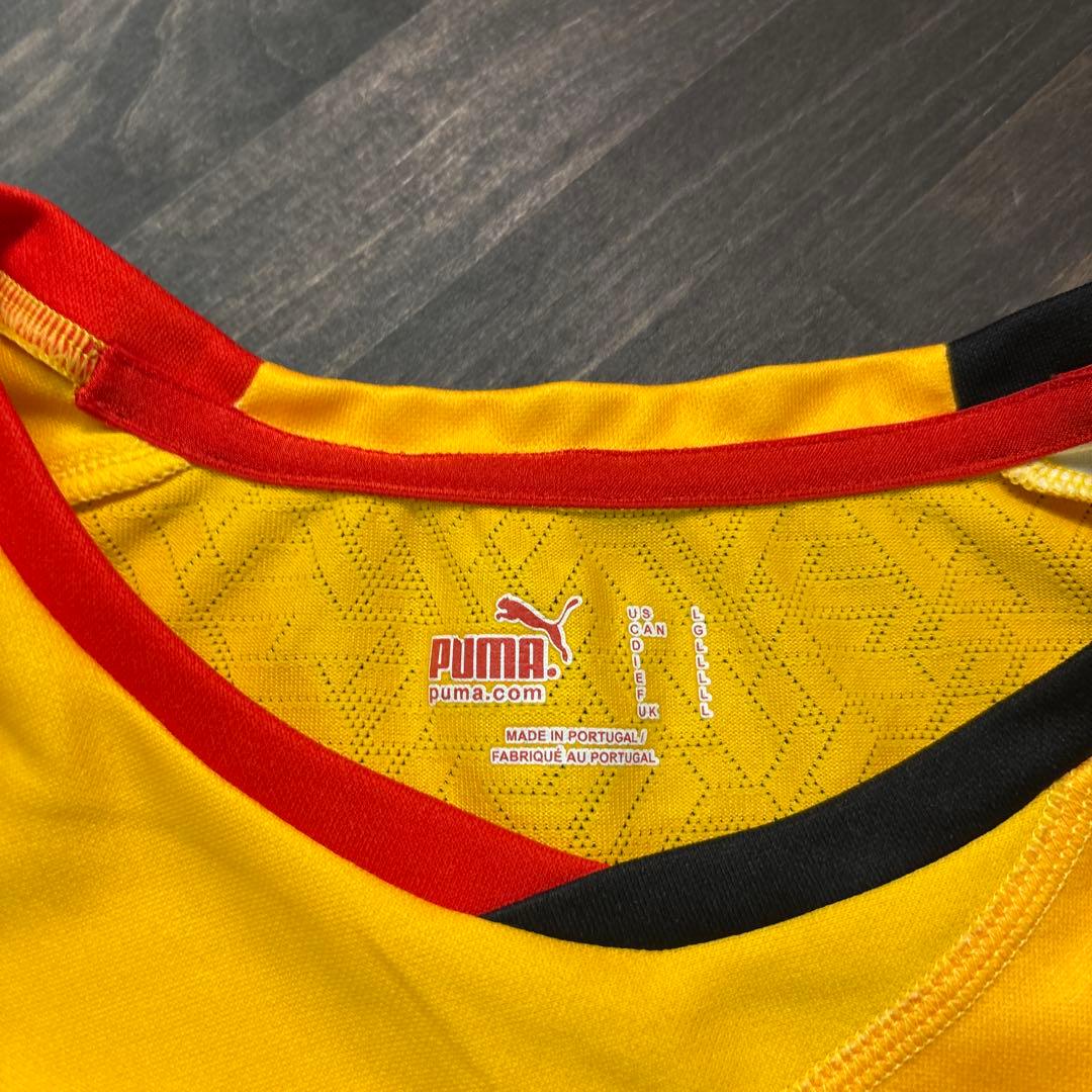 ★8SM2 PUMA 2006 ゲームシャツ　アンゴラ代表　黄色　古着