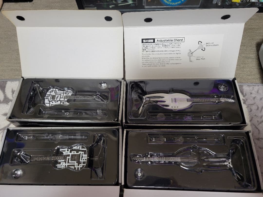 布袋寅泰リアルアクションフィギュア&ギターフィギュア4セット希望者には、おまけ付