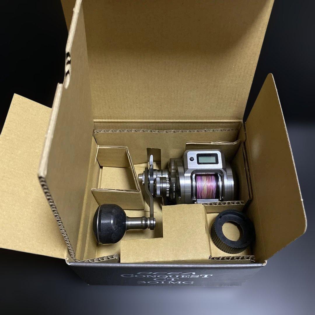 シマノ　24 オシアコンクエストCT 301MG (左)