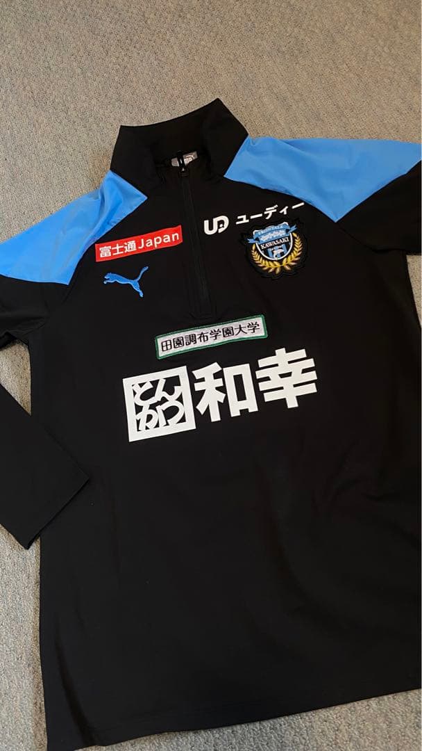 ま*ん様 川崎フロンターレ　プレマッチハーフジップトップ